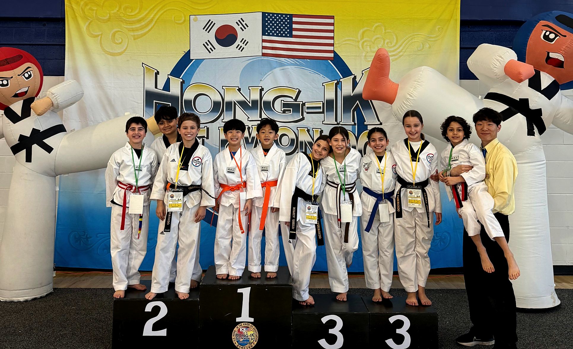 Dream Taekwondo students on the tournament podium